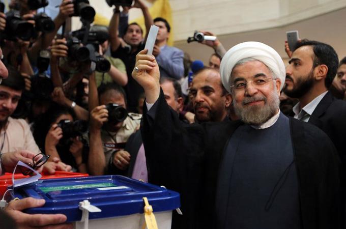 Candidate Hassan Rouhani votes in Iran Election 2013 [via Guardian, source AFP]
